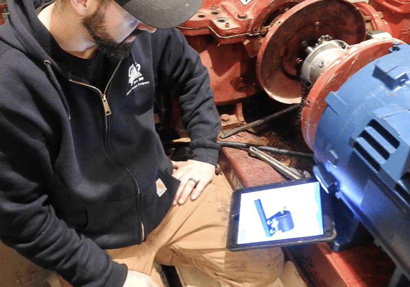 technician working in a field service video